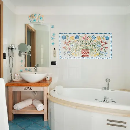 & Baia Caddinas Hotel 4*