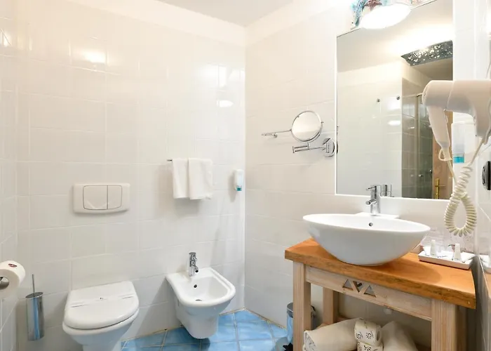 Hotel & Baia Caddinas