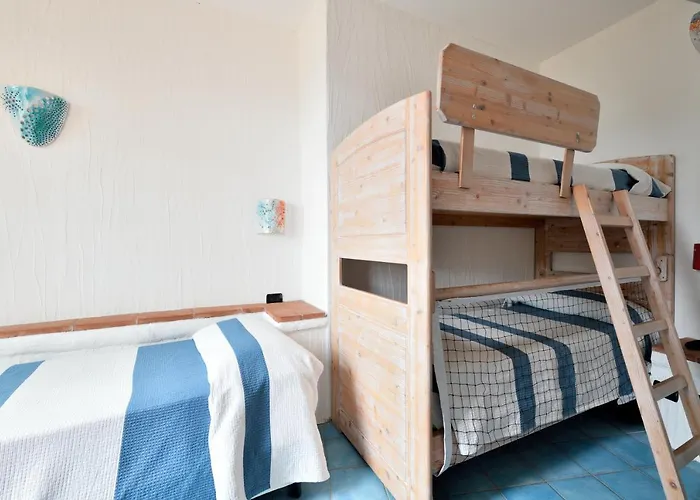 Hotel & Baia Caddinas 4*